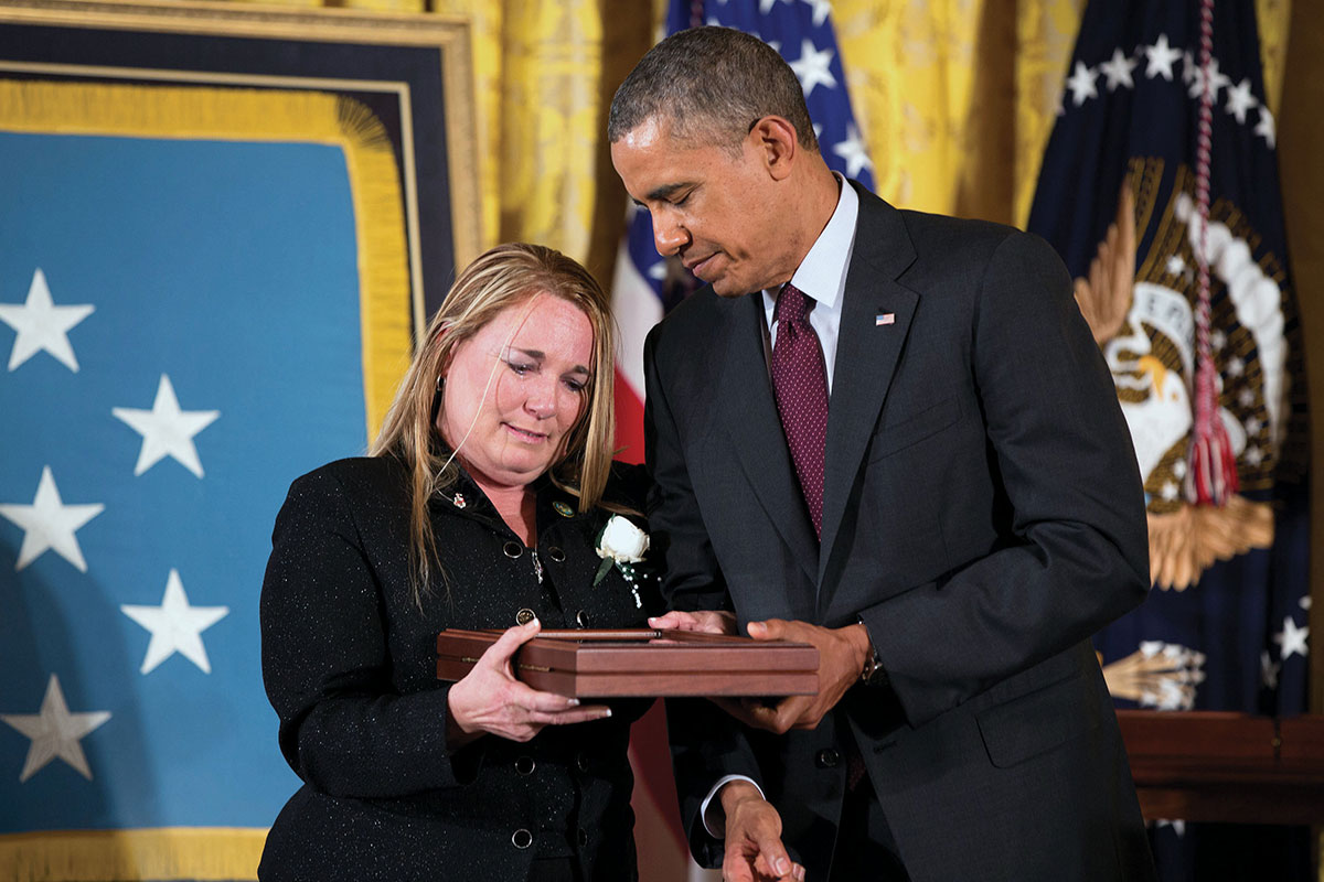 Shyrell Copas accepts the posthumously awarded Medal of Honor for her dad