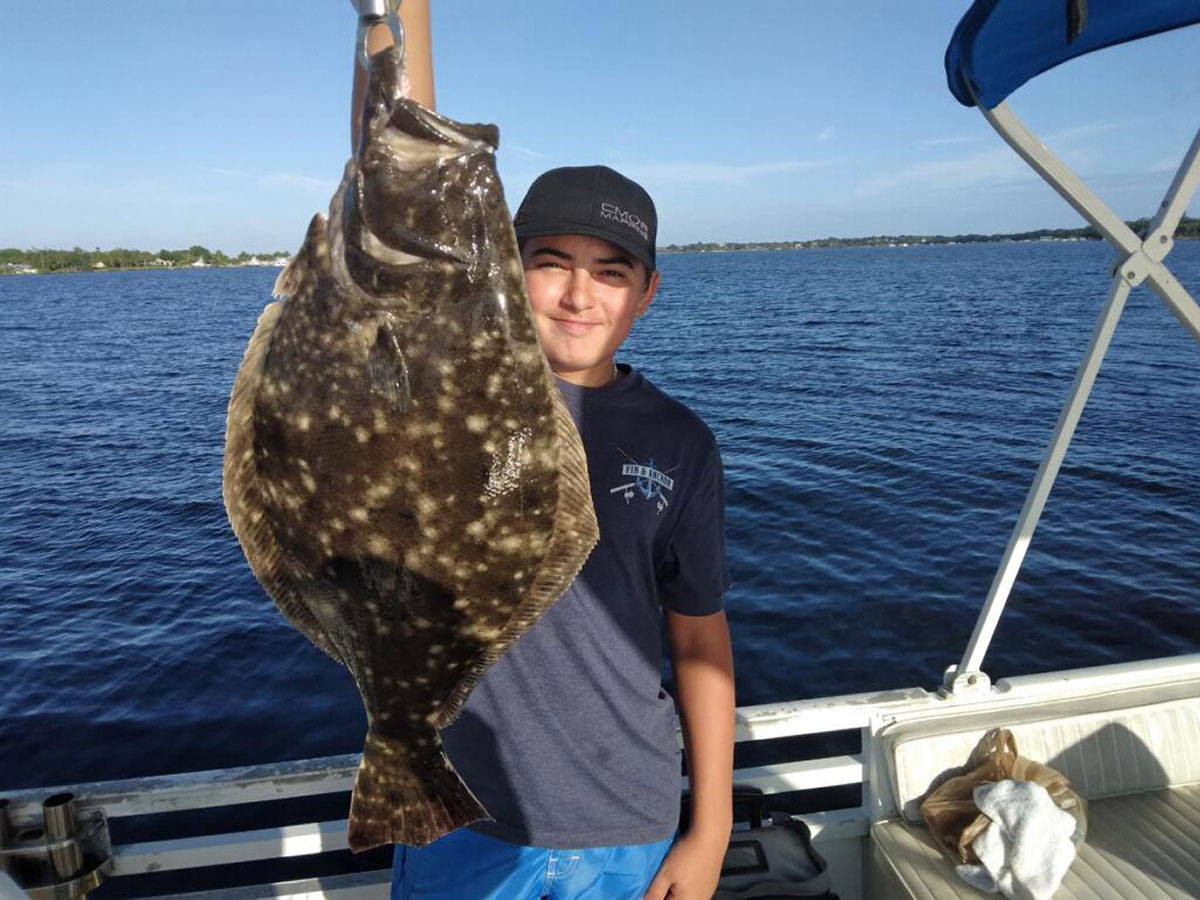 A young angler caught this flounder
